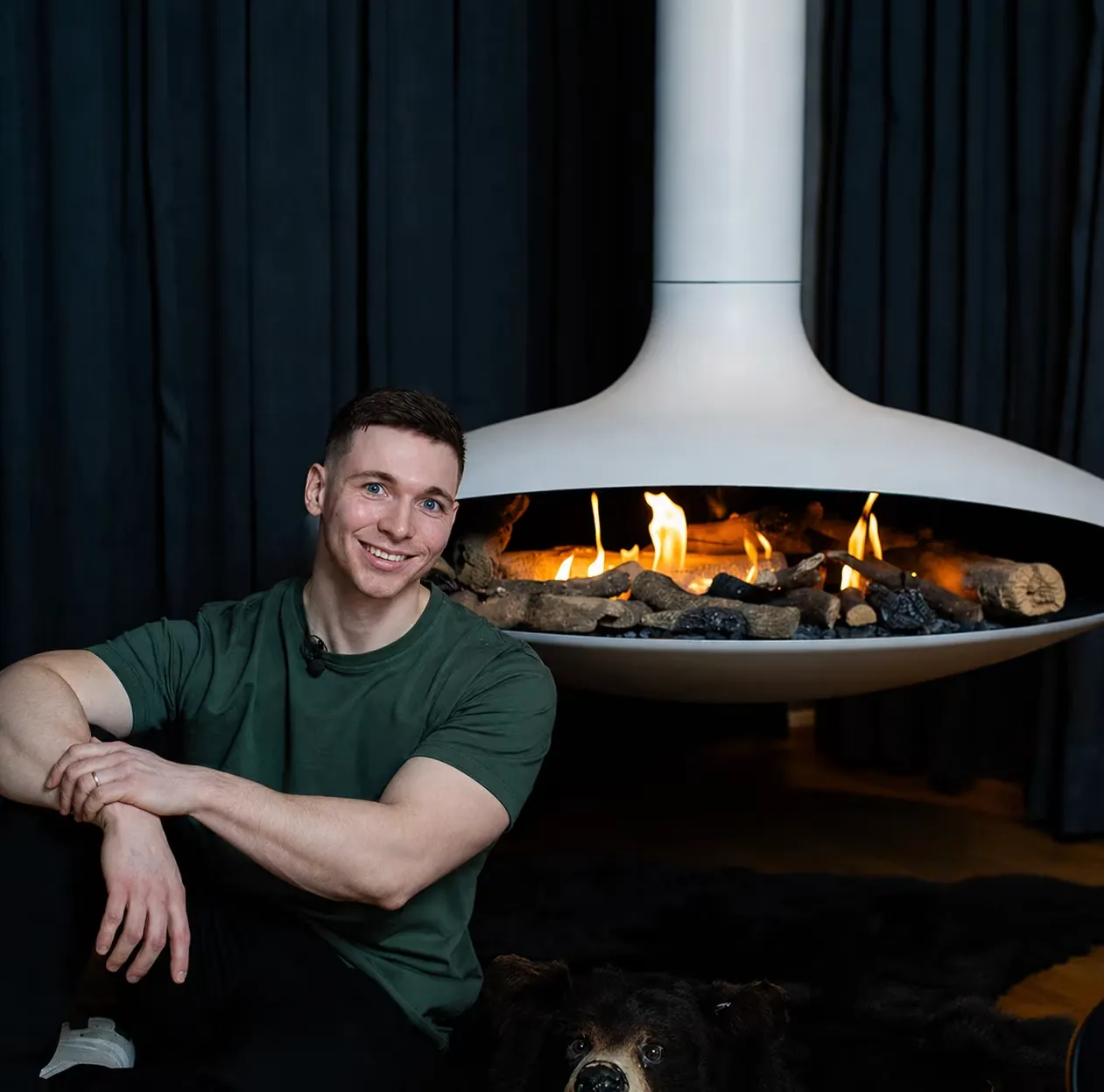Kerstens Kamine installer in front of a Focus fireplace